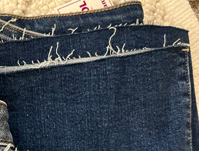 Risen Dark Wash Raw Hem Jeans